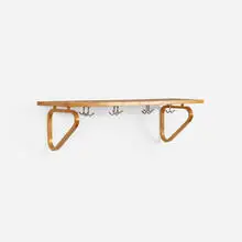 coat rack by Alvar Aalto, c. 1950, birch, aluminum, sold Sep 2018