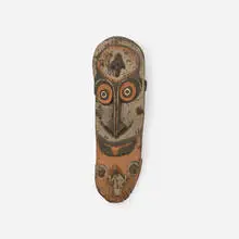 mask by Sawos people, carved and painted wood, sold Sep 2018