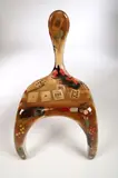Finn Stone, An Amorphic Chair, hand made fibre-glass shell incorporating glitter, cards and bottle tops,