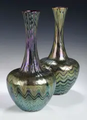 Loetz, a matched pair of iridescent glass vases,, a matched pair of iridescent glass vases,
