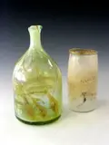 Sam Hermann, An iridescent glass bottle vase,, An iridescent glass bottle vase,