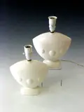 Shorter and Son, Untitled, glazed white with embossed circular motifs