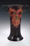 Moorcroft, A 'Pomegranate' pattern twin handled vase,