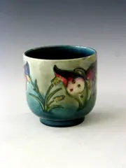 An 'Arum Lily' pattern vase, by Moorcroft, sold May 2004