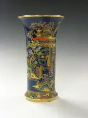 Carlton Ware, A 'China' pattern vase,, 2762, the cylindrical body gilt painted and enamelled with figures in garden, reserved on a blue ground,