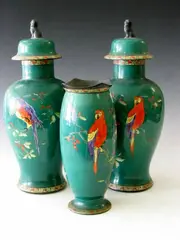Carlton Ware, A pair of baluster shaped vases and covers,