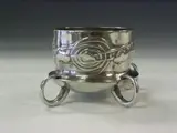 A 'Tudric' polished pewter planter, designed by Archibald Knox, by Liberty & Co., A 'Tudric' polished pewter planter, designed by Archibald Knox,, offered May 2004