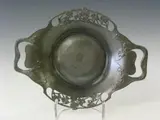 A 'Tudric' pewter basket, by Liberty & Co., A 'Tudric' pewter basket,, offered May 2004