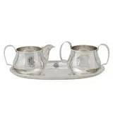 creamer and sugar set with matching oval tray by Falick Novick, sold Jun 2021