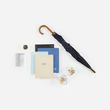 Paul Rand, corporate logo gift collection, c. 1990, glass, porcelain, fabric, beech, vinyl, crystal