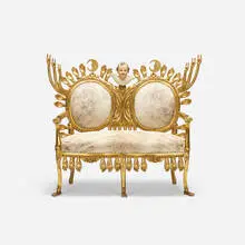 Pedro Friedeberg, settee, 1963, gilt and carved mahogany, cowhide, found object