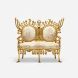 Pedro Friedeberg, settee, 1963, gilt and carved mahogany, cowhide, found object