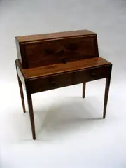Cotswold school, A walnut bureau,, A walnut bureau,