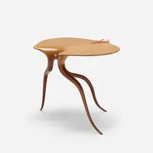 Mark Levin, occasional table, 1975, carved and laminated oak, laminated walnut
