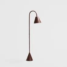 floor lamp by Jacques Adnet, c. 1950, painted leather over steel, sold Apr 2018