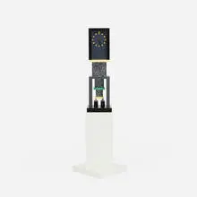 Metropole clock by George Sowden, 1982, laminate over wood, Plexiglas, lacquered wood, enameled aluminum, enameled brass, sold Apr 2018
