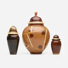 Michael Mode, Collection of three lidded vessels, 1999, 2009, 2011, holly, purple heart, yellow heart, ebony, buckeye, blood wood, lacewood, padauk, cocobolo