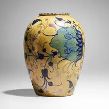Vase with stylized flowers by Pietro Melandri, c. 1920, lustre-glazed earthenware, sold Nov 2023