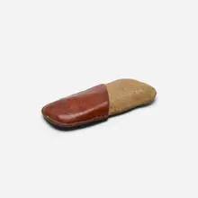 paperweight, model 4339 by Carl Auböck, 1950, leather, stone, sold Apr 2018