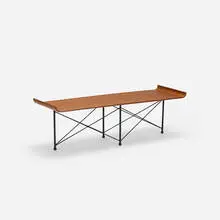 coffee table by Franco Campo and Carlo Graffi, c. 1955, molded walnut plywood, enameled steel, rubber, sold Apr 2018