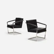 Richard Thompson, armchairs, pair, c. 1965, leather, chrome-plated steel, stainless steel