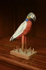 Bryan Illsley, Untitled, a carved wooden and polychrome decorated parrot