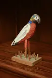 Bryan Illsley, Untitled, a carved wooden and polychrome decorated parrot