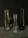 Per Lütken, for Holmegaard, in tall smoked glass