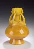 Christopher Dresser, A yellow glazed vase,