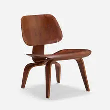 LCW by Charles and Ray Eames, molded ash plywood, rubber, sold Nov 2023