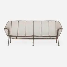 Sculptura sofa by Russell Woodard, c. 1965, enameled steel, sold Nov 2023