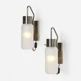 Wall lamps, pair by Luigi Caccia Dominioni, c. 1970, glass, brushed stainless steel, sold Nov 2023