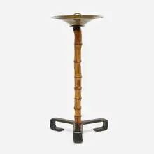 Ashtray stand by Jacques Adnet, c. 1940, bamboo, stitched leather, brass, sold Nov 2023