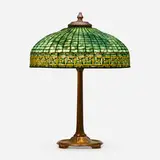 Greek Key table lamp by Tiffany Studios, c. 1910, leaded glass, patinated bronze, sold Oct 2023