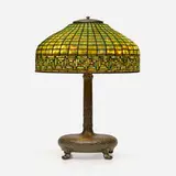Greek Key table lamp by Tiffany Studios, c. 1910, leaded glass, patinated bronze, sold Oct 2023