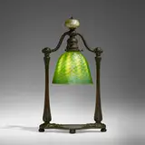 Bell-shaped lamp by Tiffany Studios, c. 1910, patinated bronze, hand-blown Favrile glass, sold Oct 2023