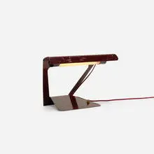 table lamp by Charlotte Perriand, c. 1955, enameled steel, brass, sold Apr 2018