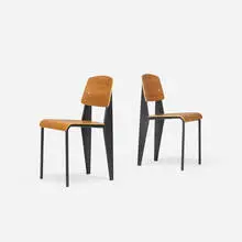 Standard chairs, pair by Jean Prouvé, enameled steel, teak plywood, aluminum, rubber, sold Apr 2018