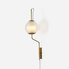 Pallone sconce, model LP11 by Luigi Caccia Dominioni, 1958, brass, frosted glass, sold Apr 2018