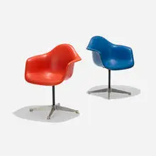 PACs-1s, pair by Charles and Ray Eames, vinyl, molded fiberglass, cast aluminum, enameled steel, rubber, plastic, sold Mar 2018