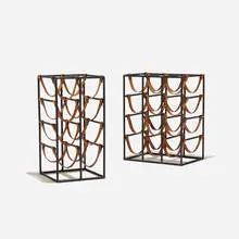 Arthur Umanoff, wine racks, set of two, c. 1955, enameled steel, leather