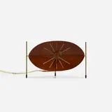 Watermelon table clock, model 2219D by George Nelson & Associates, 1954, walnut, enameled steel, enameled aluminum, rubber, lacquered wood, sold Mar 2018