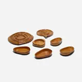 Russel Wright, collection of seven Oceana bowls, 1935, olivewood, ash, cherry