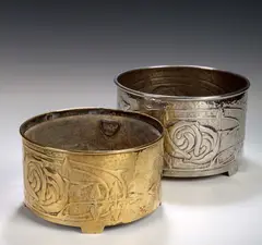 A circular brass planter, by Marion Henderson Wilson, A circular brass planter,, sold Nov 2003
