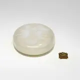 Houppes box by René Lalique, c. 1921, opalescent glass, sold Oct 2023