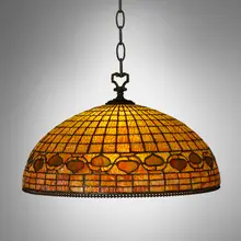 Vine Border (Acorn) hanging shade by attribution Tiffany Studios, c. 1910, leaded glass, patinated bronze, sold Oct 2023