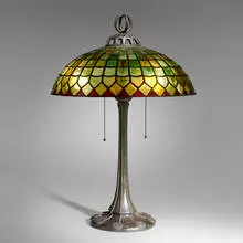 Early table lamp by Handel, c. 1902, patinated metal, leaded glass, sold Oct 2023