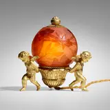 Nightlight with trumpet flowers by Émile Gallé, c. 1900, acid-etched cameo glass, gilt metal, sold Oct 2023