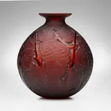 René Lalique, Milan vase, c. 1929, dark amber glass with white patina