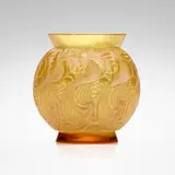 René Lalique, Le Mans vase, c. 1931, clear amber glass with white patina